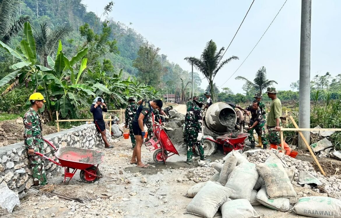 Kolaborasi Masyarakat dan TNI dalam Pembangunan Infrastruktur Parumpanai Kolaborasi Masyarakat dan TNI dalam Pembangunan Infrastruktur Parumpanai