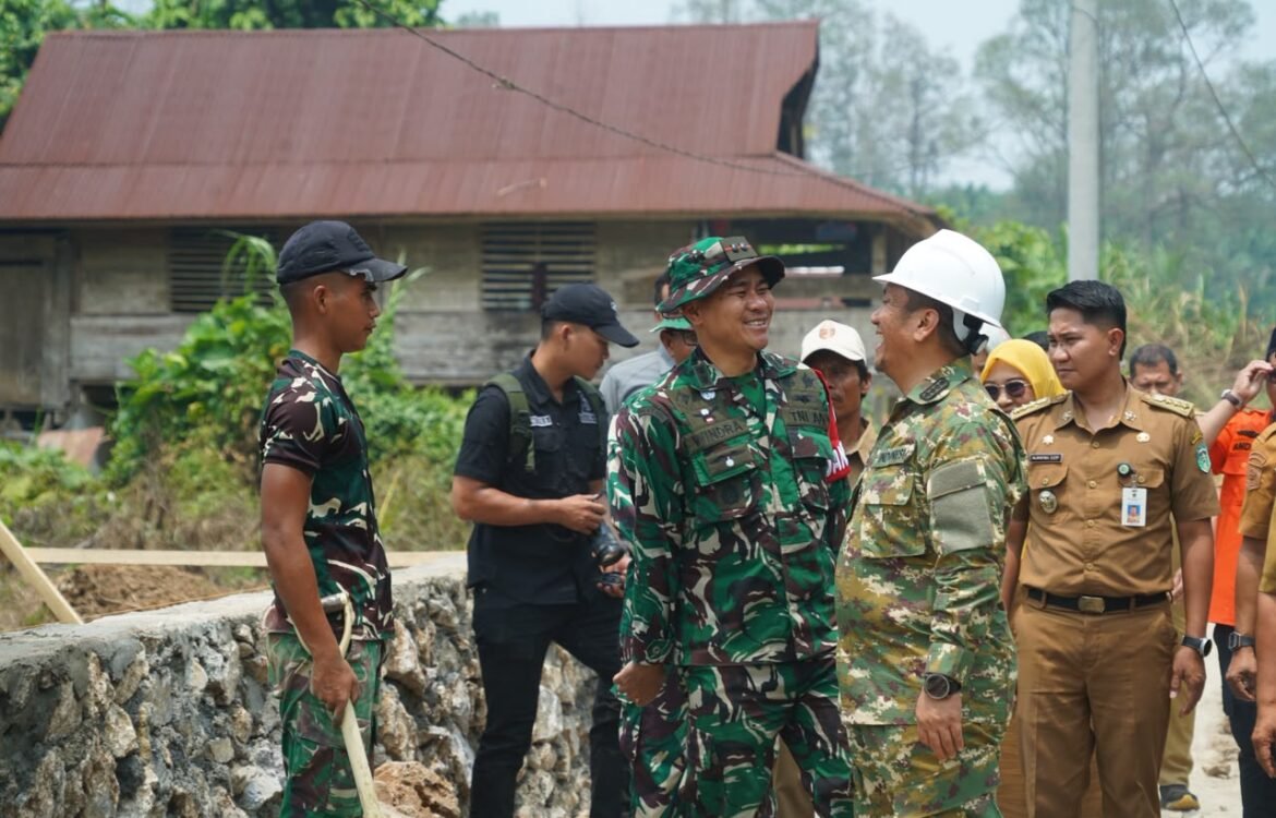 Evaluasi Proyek TMMD ke-130 oleh Bupati di Parumpanai untuk Masyarakat Evaluasi Proyek TMMD ke-130 oleh Bupati di Parumpanai untuk Masyarakat